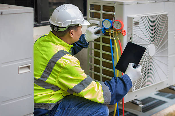Professional Air Duct Cleaning technician working in Brookhaven, GA